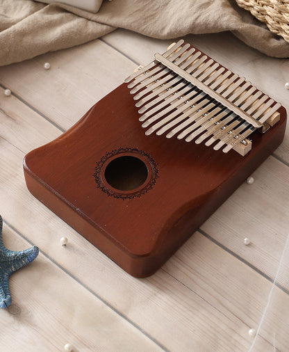 Kalimba Holz Gänseblümchen dunkel